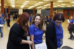 Teachers receiving their gift cards at the 3rd Annual AIM High event.
